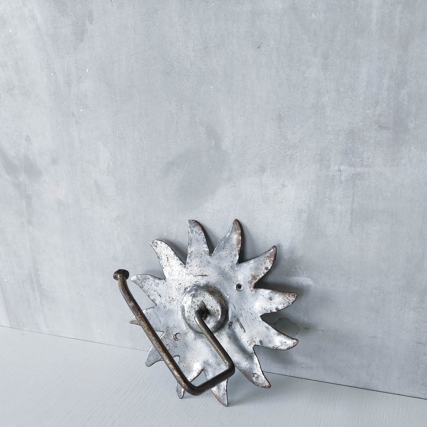 Vintage 1990s handmade artist metalwork steel cut sun toilet roll holder