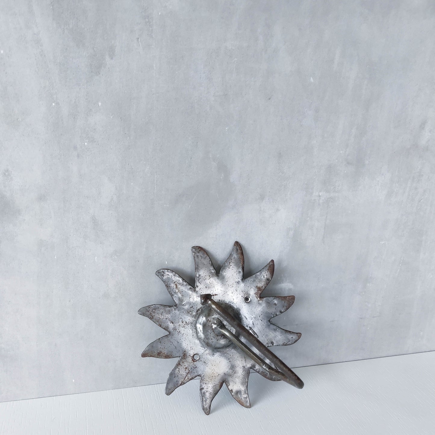 Vintage 1990s handmade artist metalwork steel cut sun toilet roll holder