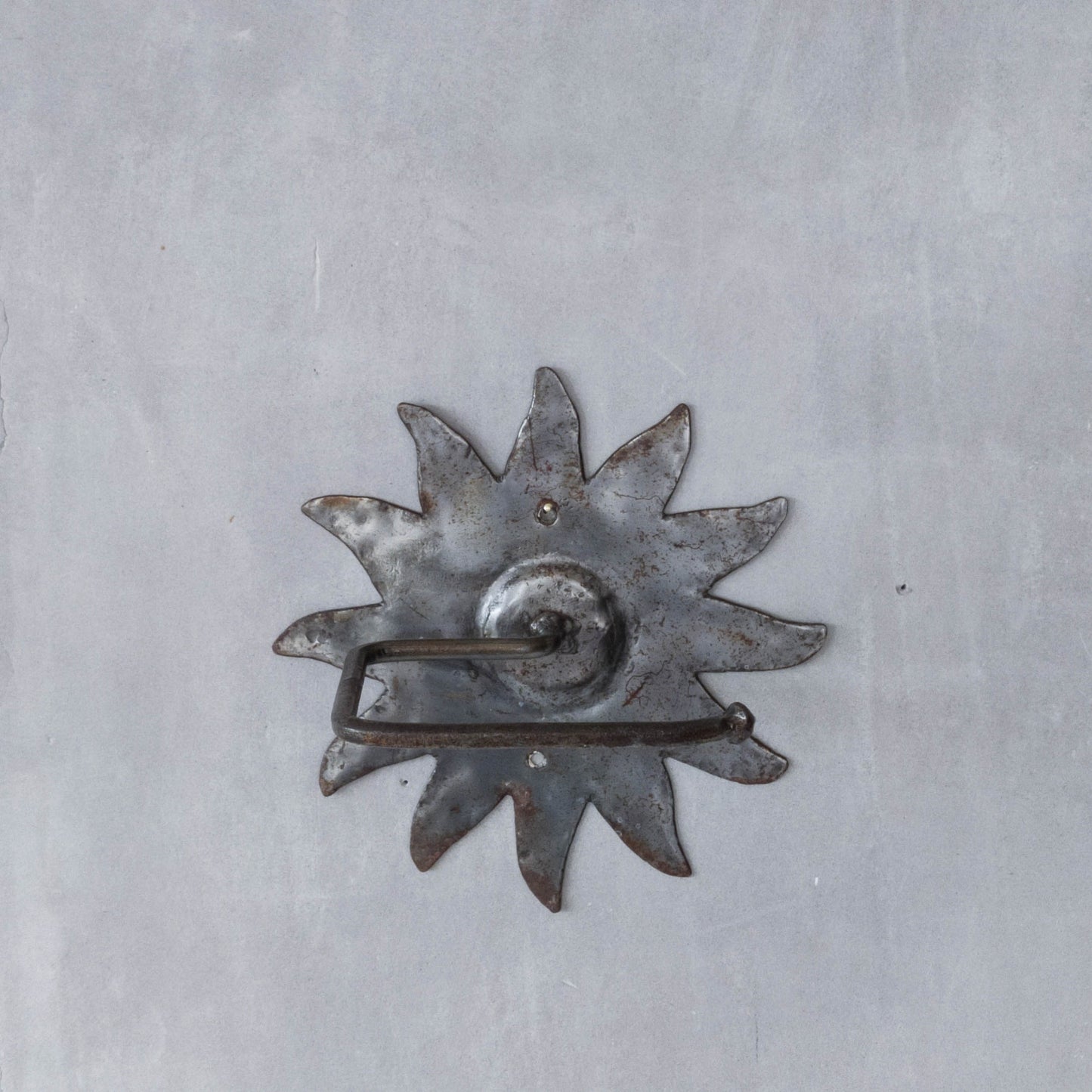 Vintage 1990s handmade artist metalwork steel cut sun toilet roll holder