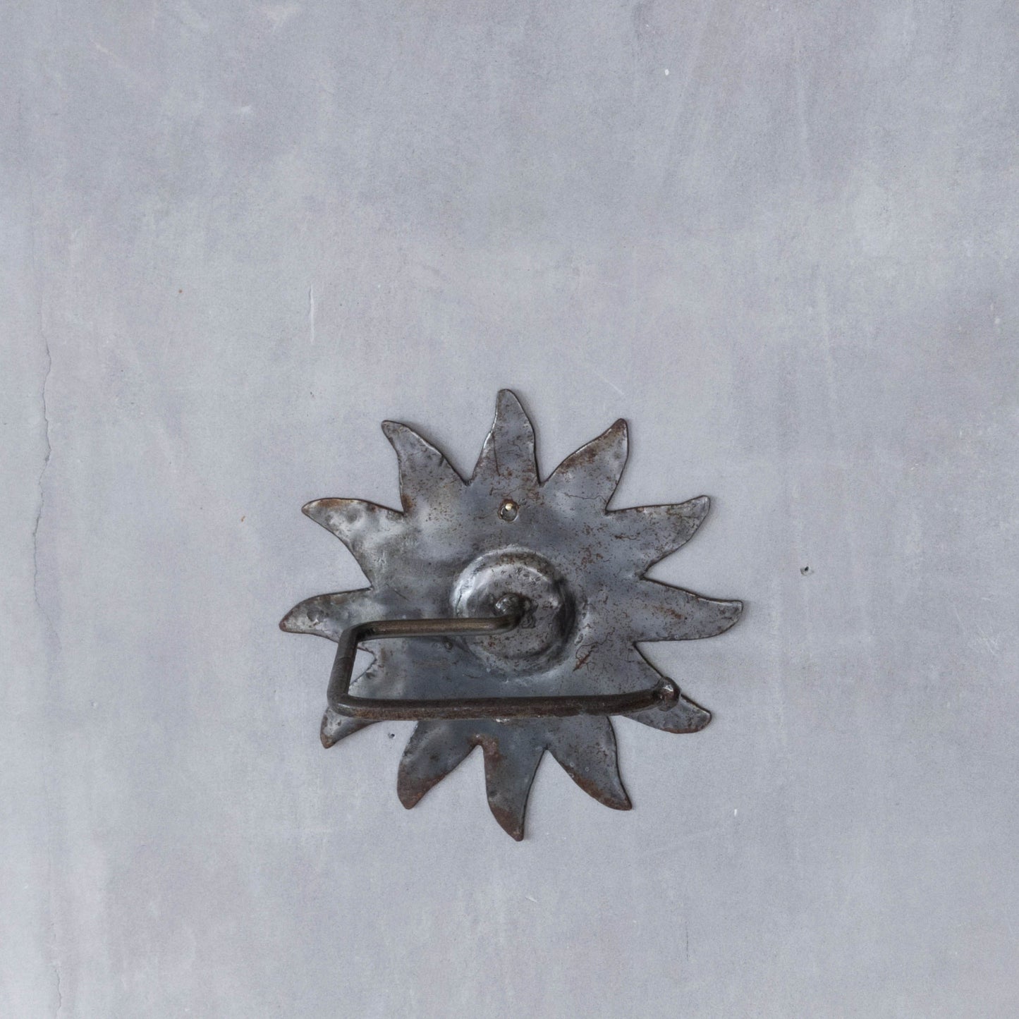 Vintage 1990s handmade artist metalwork steel cut sun toilet roll holder