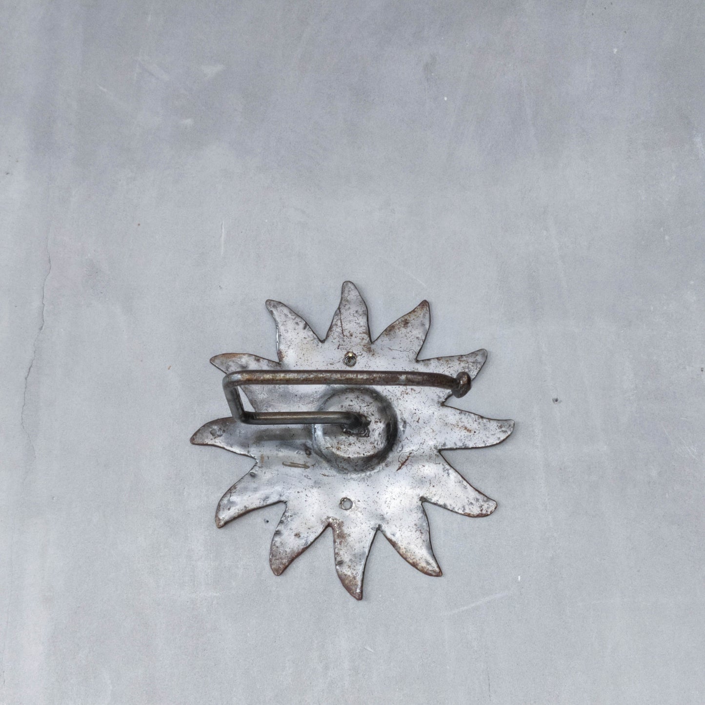 Vintage 1990s handmade artist metalwork steel cut sun toilet roll holder