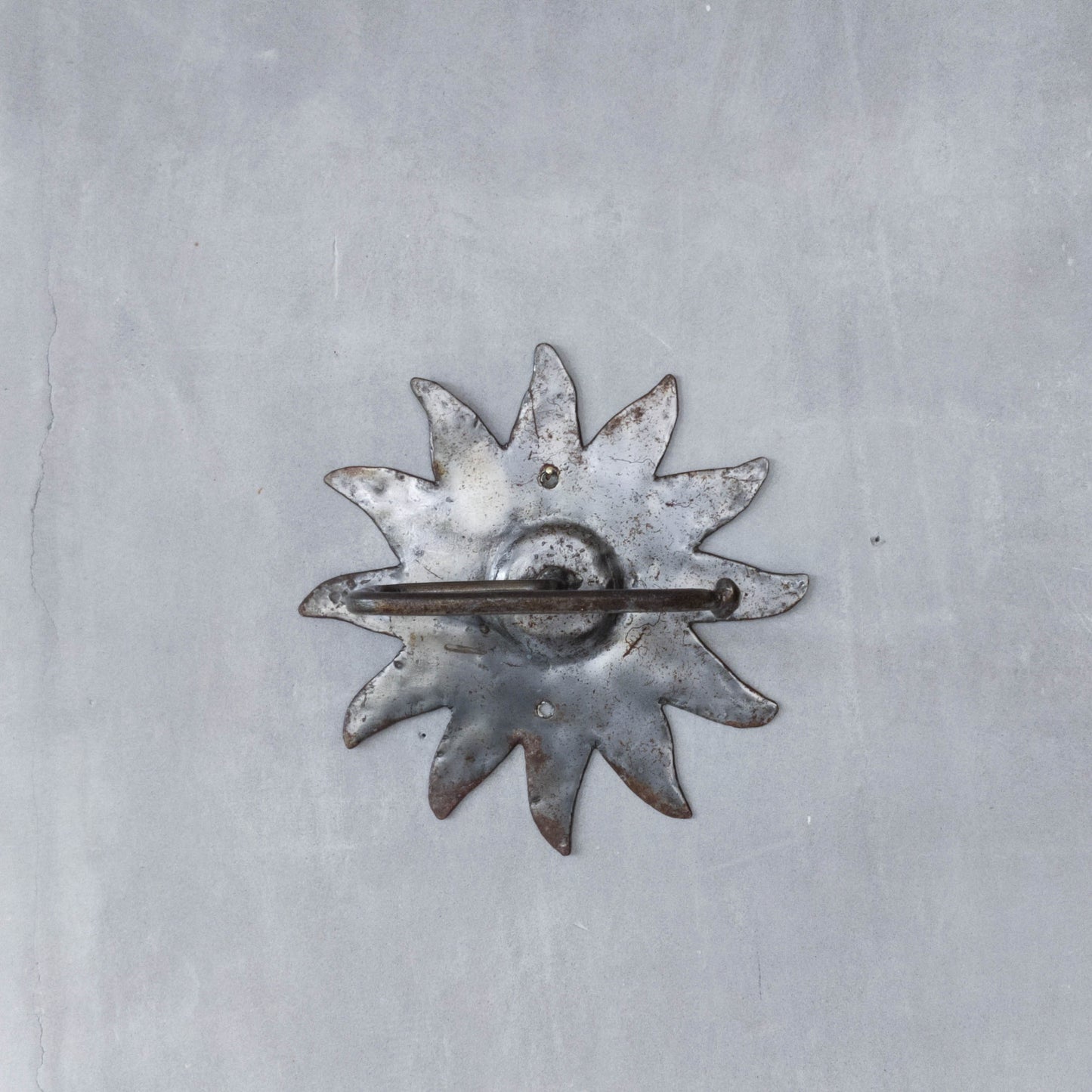 Vintage 1990s handmade artist metalwork steel cut sun toilet roll holder