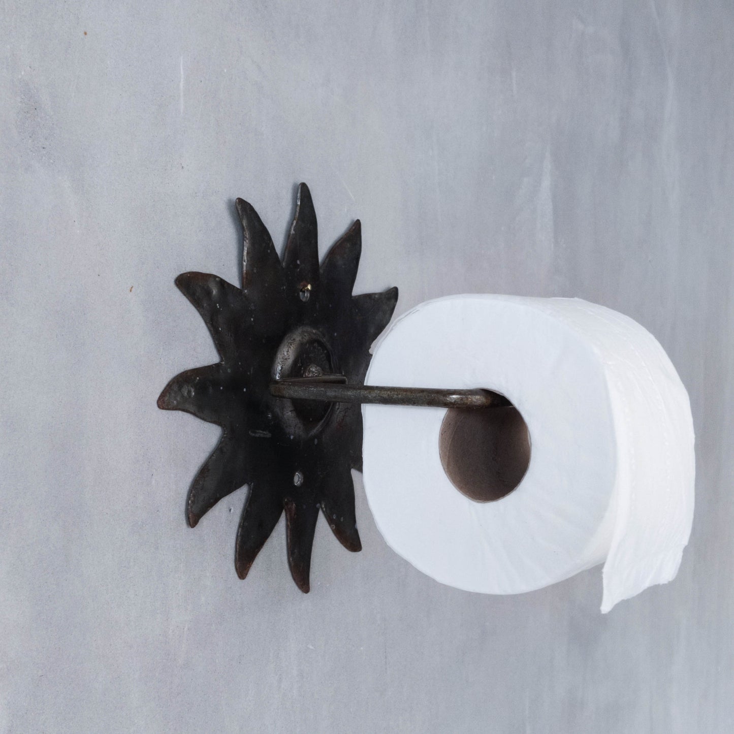 Vintage 1990s handmade artist metalwork steel cut sun toilet roll holder