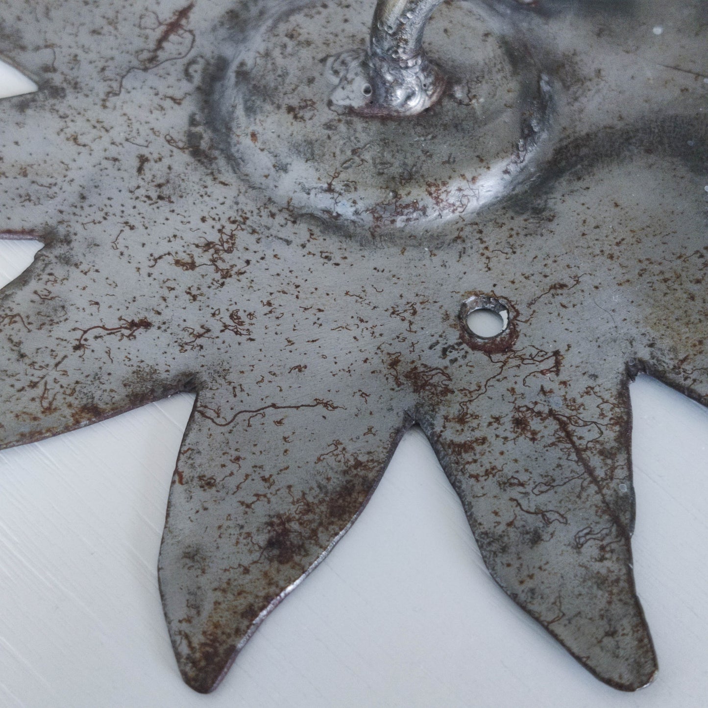 Vintage 1990s handmade artist metalwork steel cut sun toilet roll holder