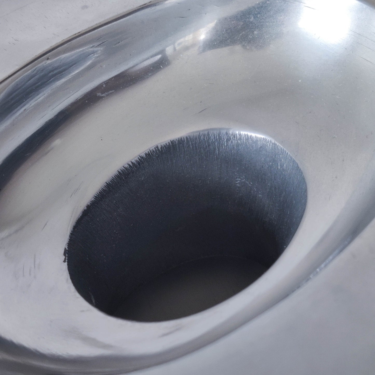 Vintage large sculptural modernist hand cast aluminium oval donut vase