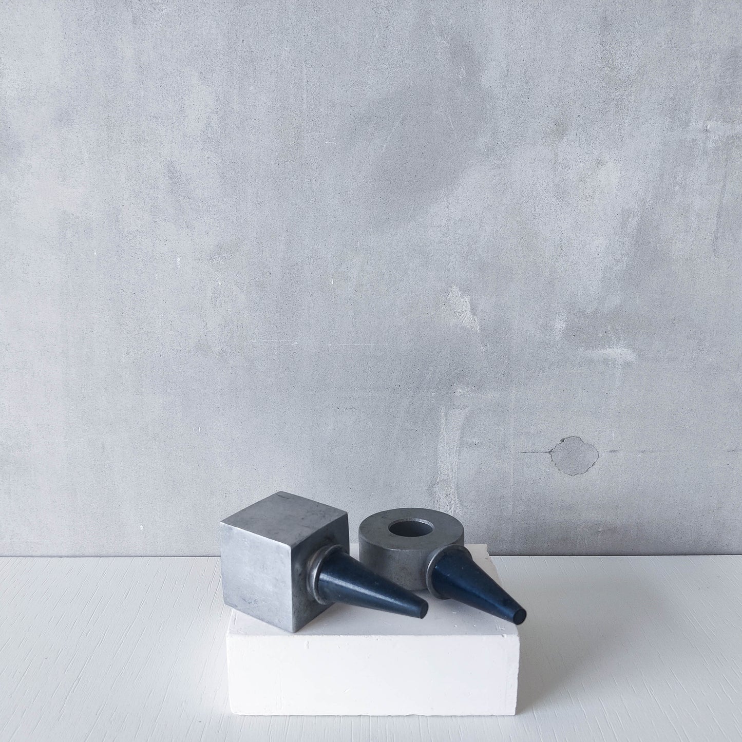 Pair of vintage cast aluminium wine bottle stoppers tops modernist geometric form