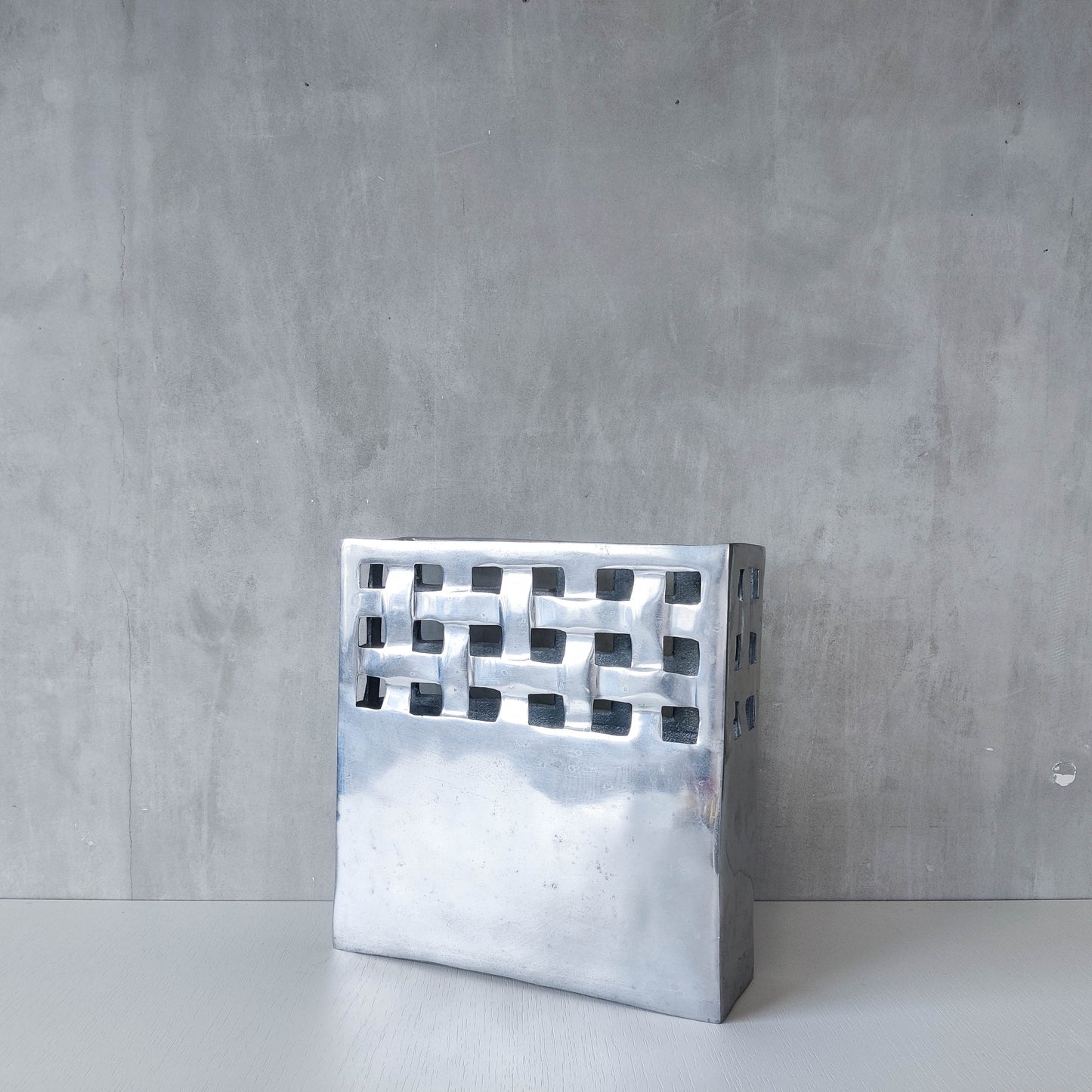 Vintage 00s hand cast aluminium lattice basket weave magazine rack holder