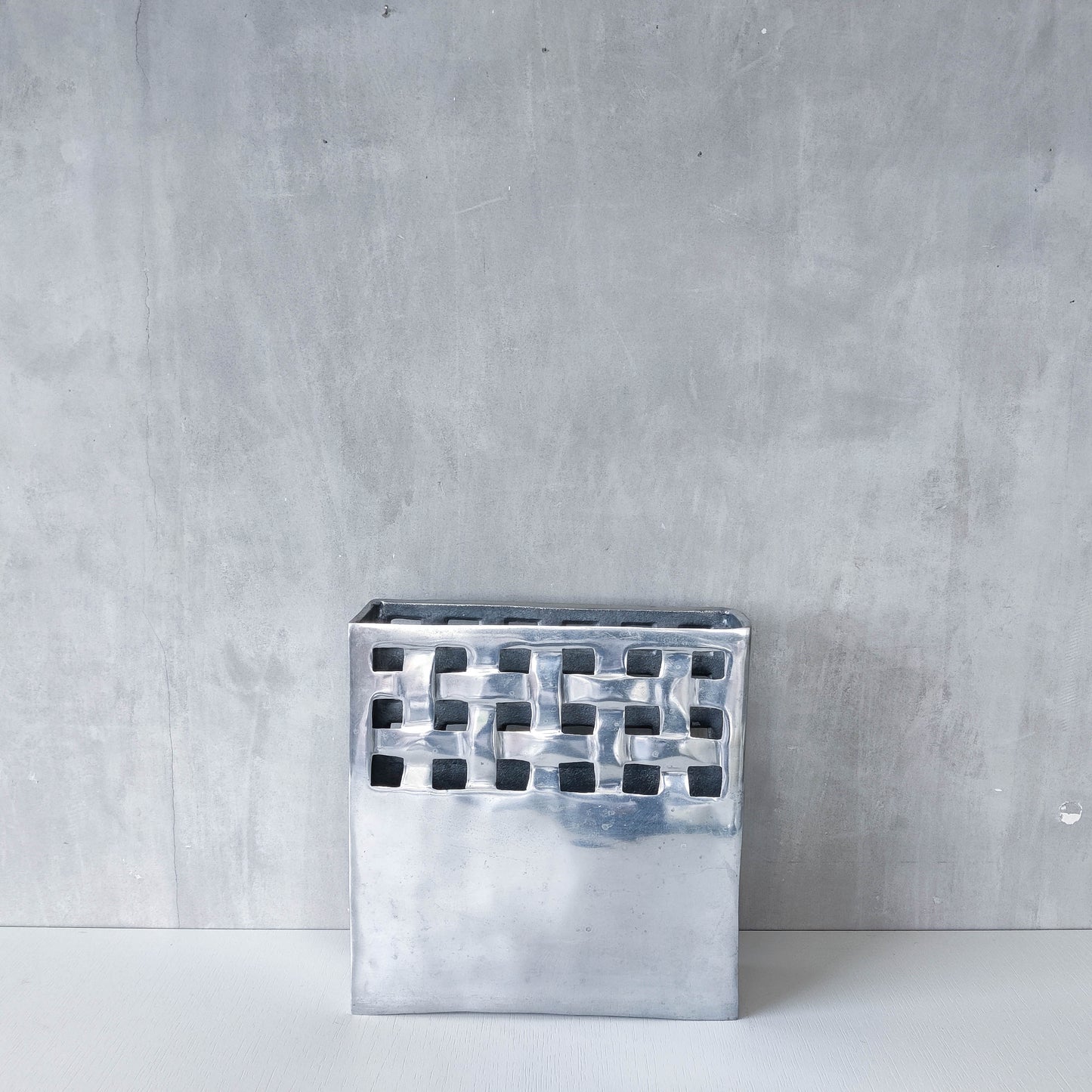 Vintage 00s hand cast aluminium lattice basket weave magazine rack holder