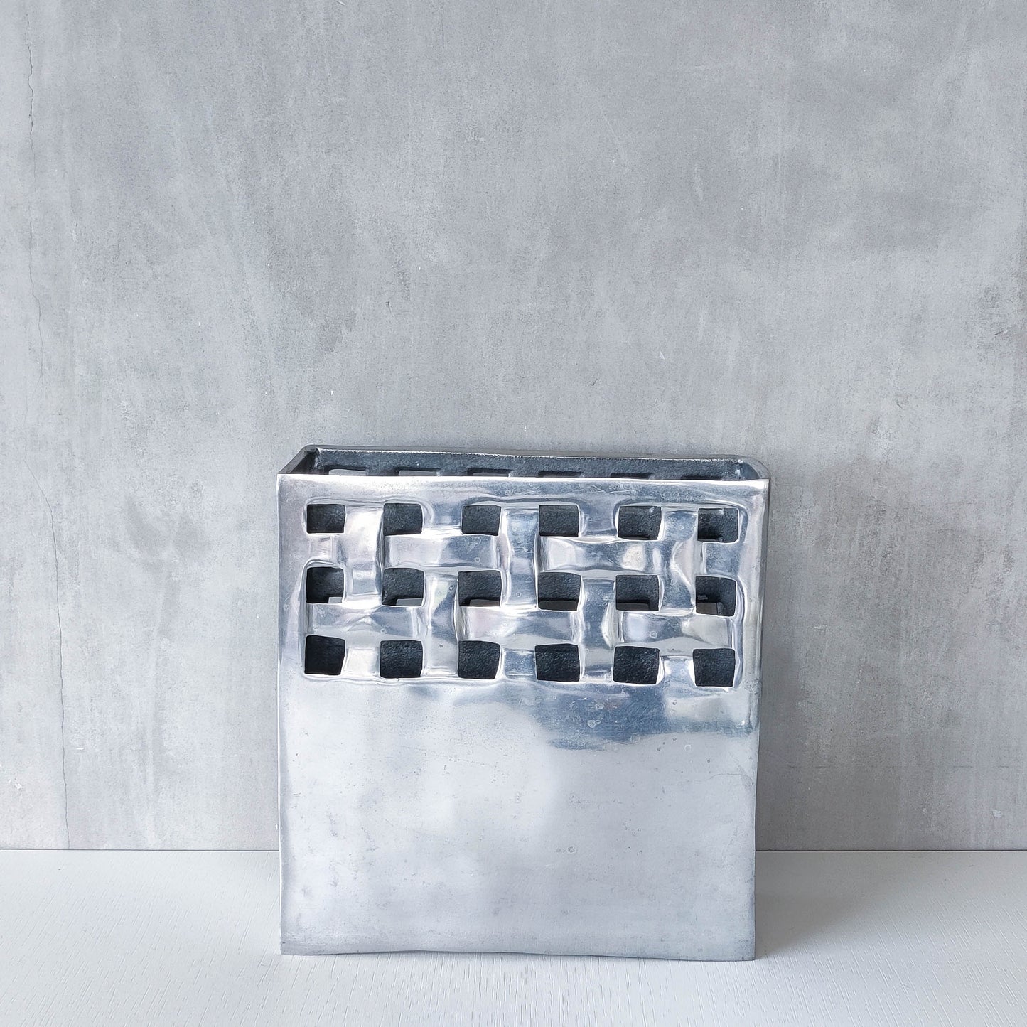 Vintage 00s hand cast aluminium lattice basket weave magazine rack holder