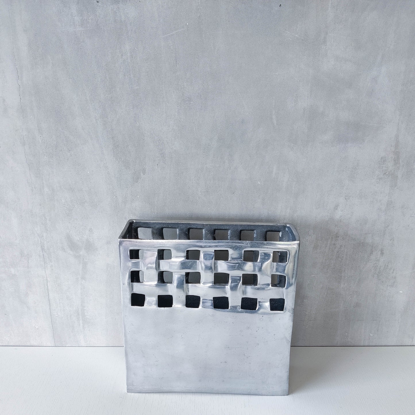 Vintage 00s hand cast aluminium lattice basket weave magazine rack holder