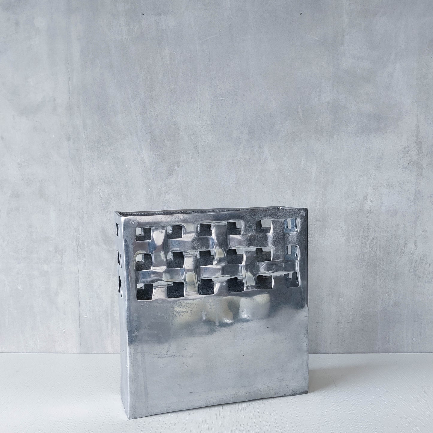 Vintage 00s hand cast aluminium lattice basket weave magazine rack holder