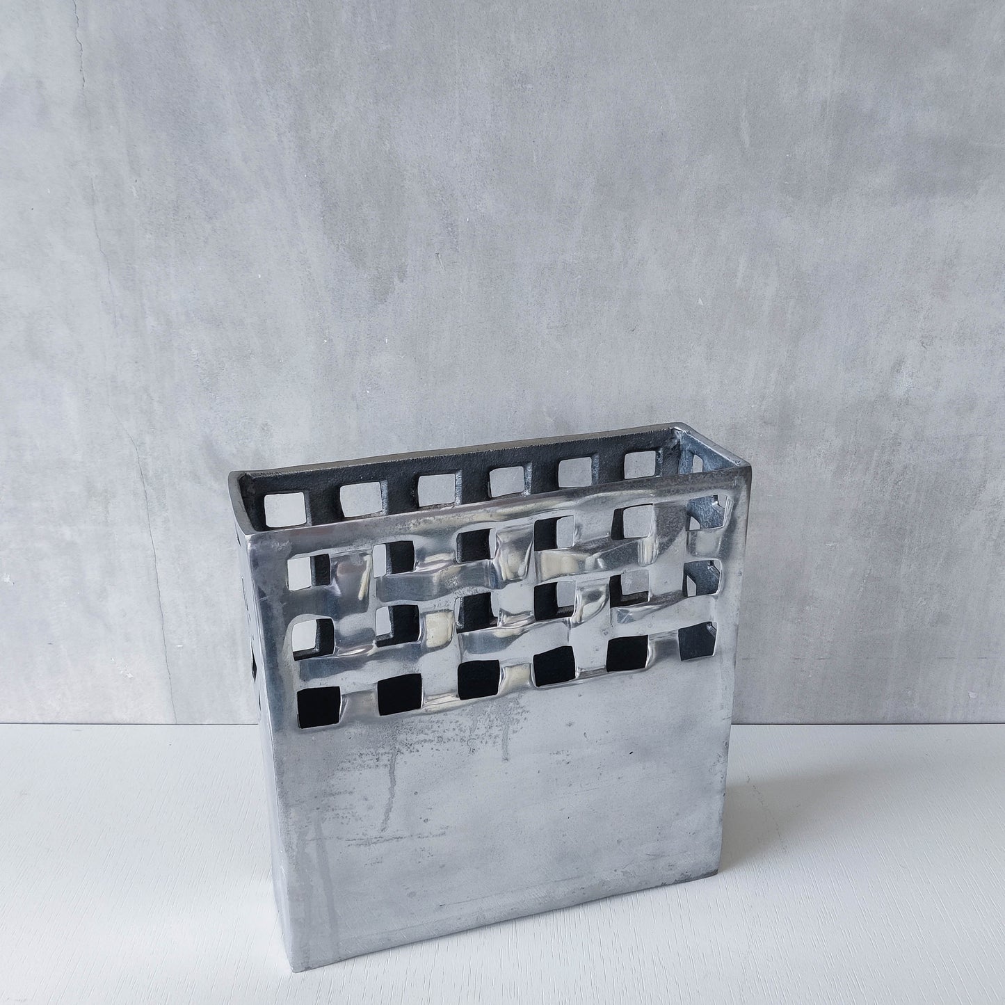 Vintage 00s hand cast aluminium lattice basket weave magazine rack holder