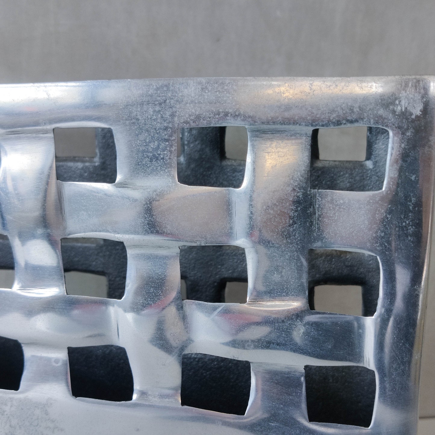 Vintage 00s hand cast aluminium lattice basket weave magazine rack holder