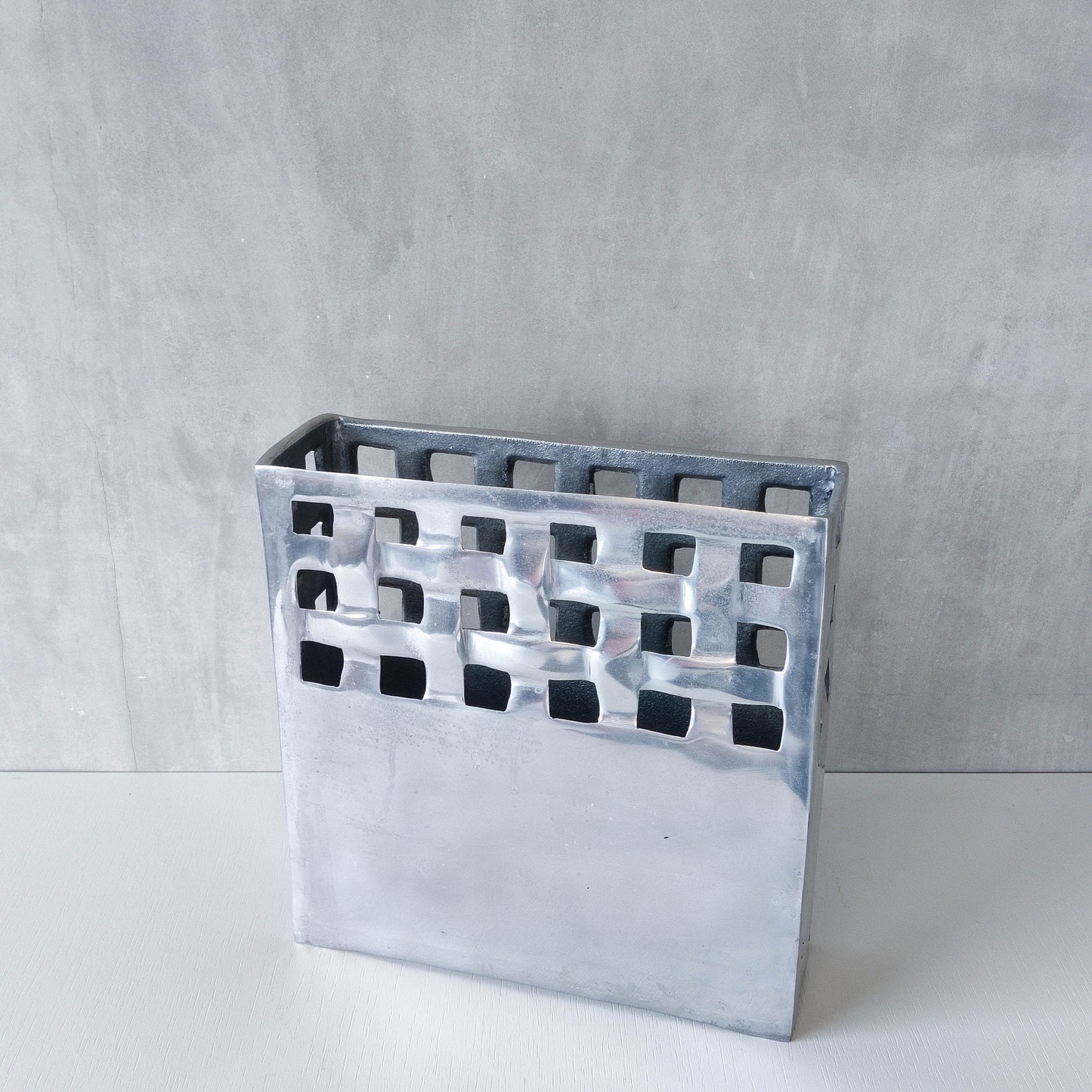 Vintage 00s hand cast aluminium lattice basket weave magazine rack holder