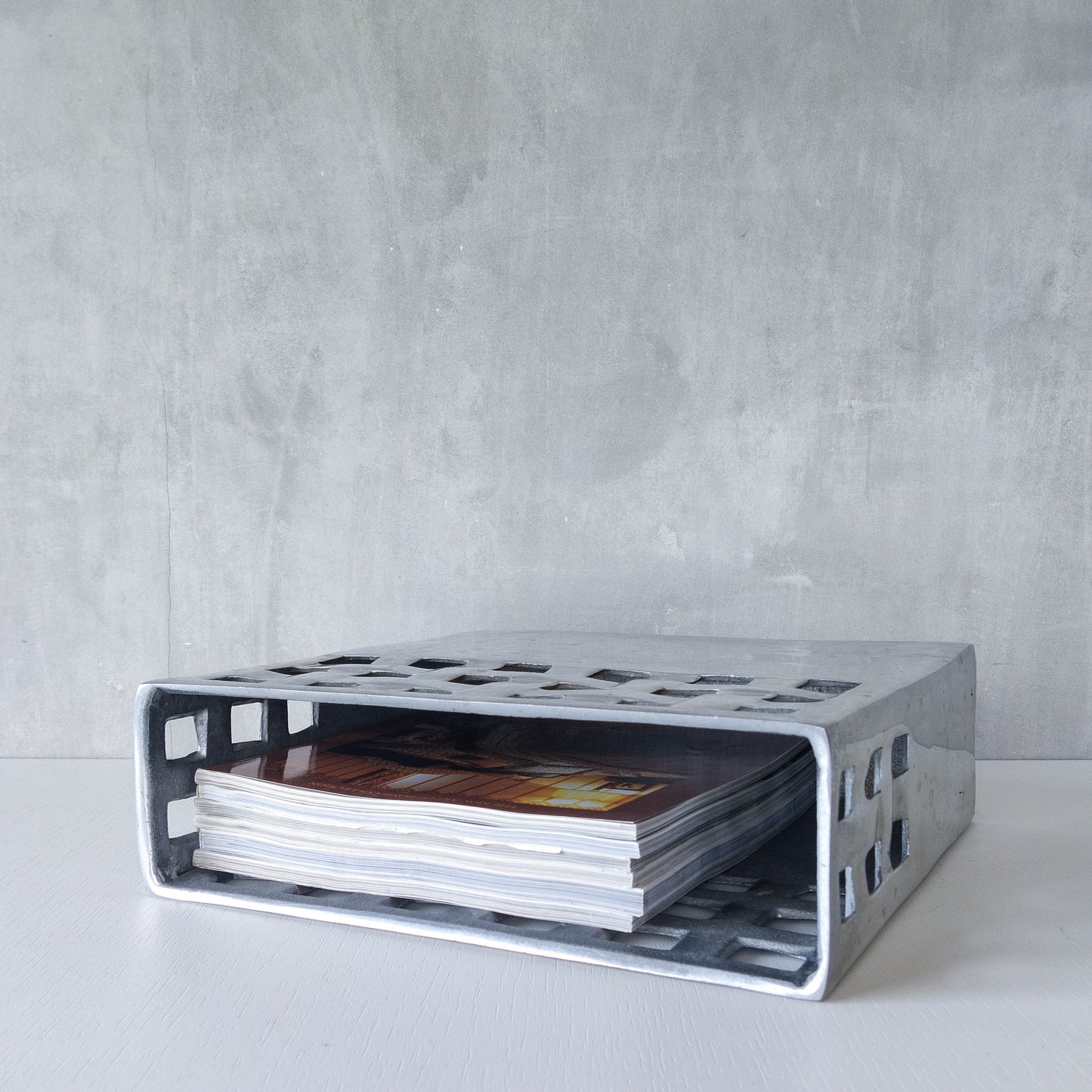 Vintage 00s hand cast aluminium lattice basket weave magazine rack holder