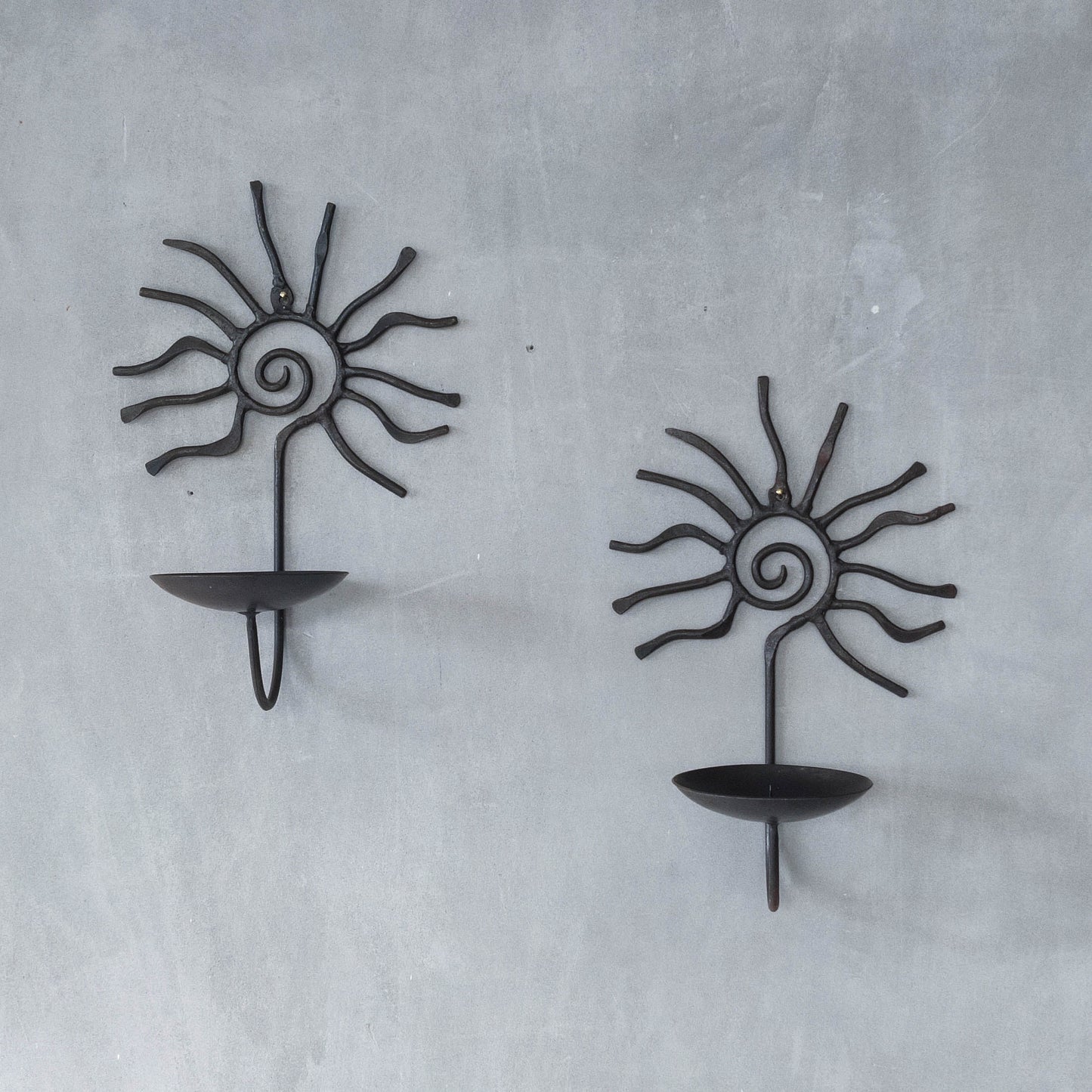Pair of vintage 90s welded steel sun ray spiral swirl candle wall sconces