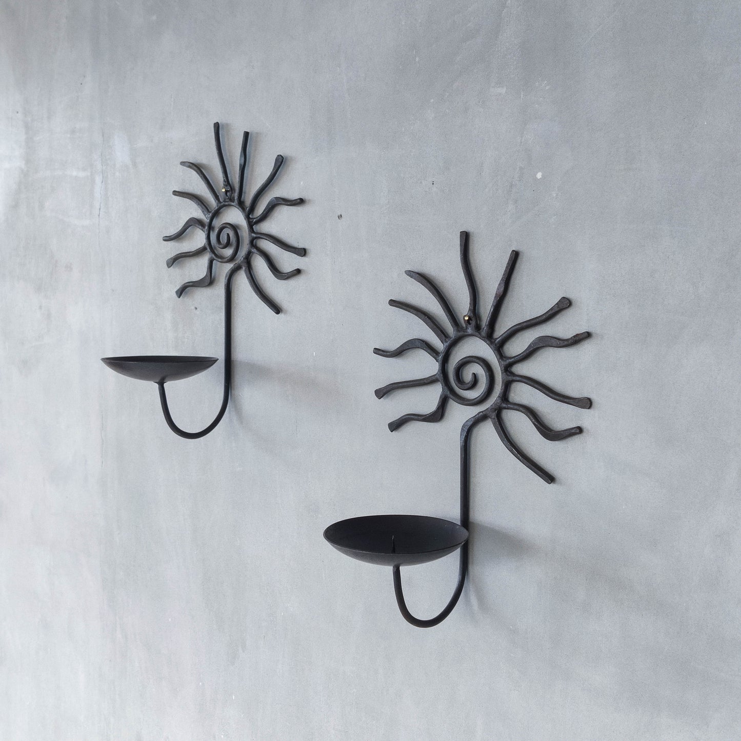 Pair of vintage 90s welded steel sun ray spiral swirl candle wall sconces