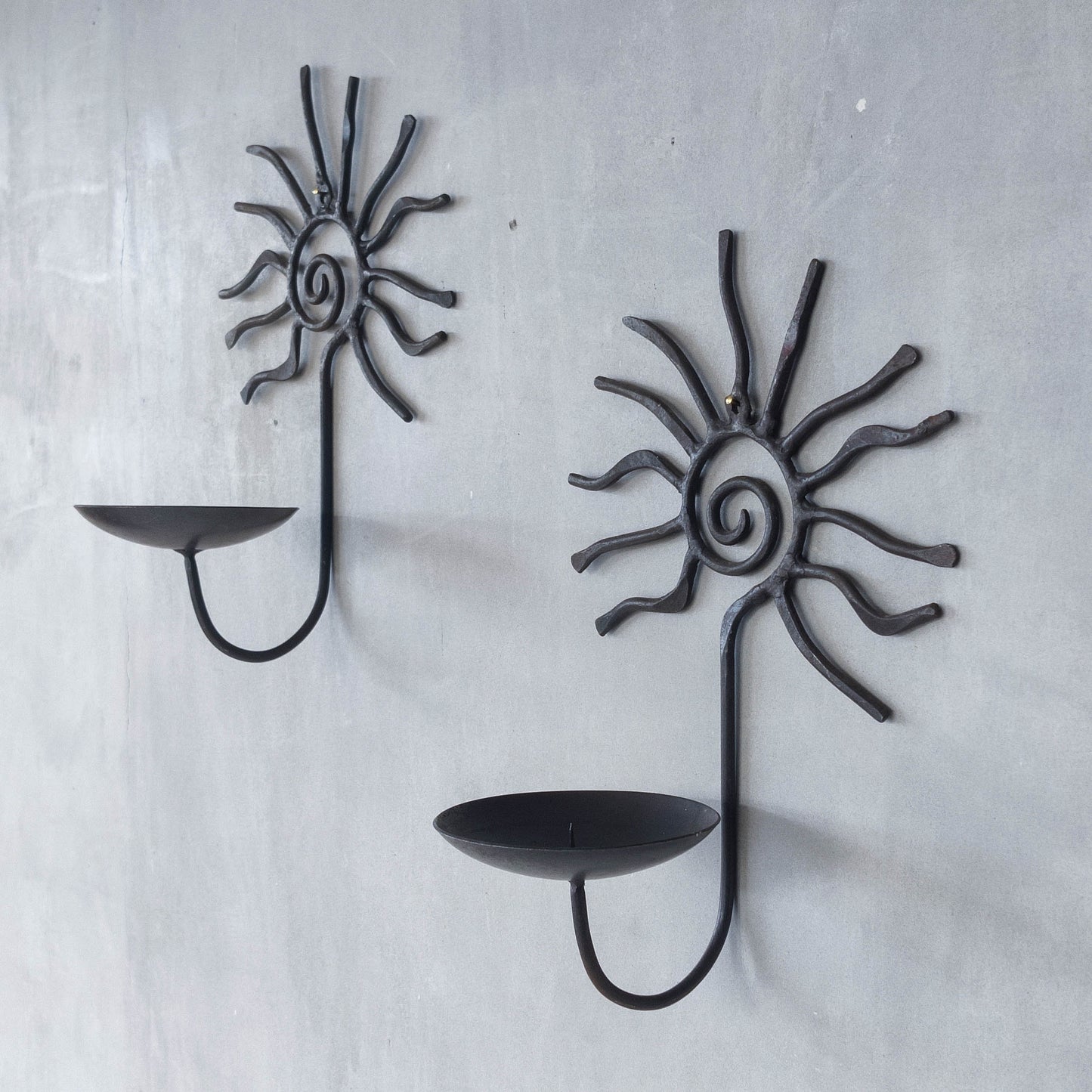 Pair of vintage 90s welded steel sun ray spiral swirl candle wall sconces