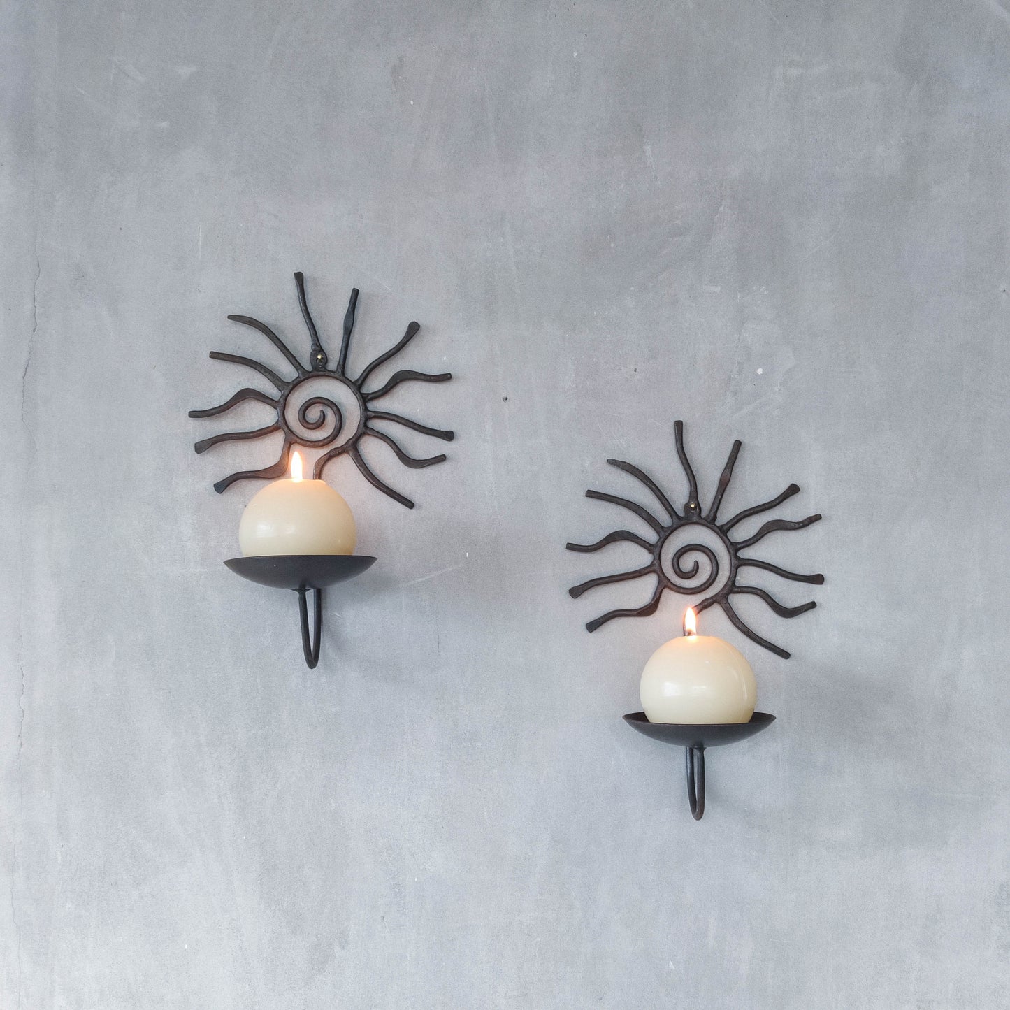 Pair of vintage 90s welded steel sun ray spiral swirl candle wall sconces