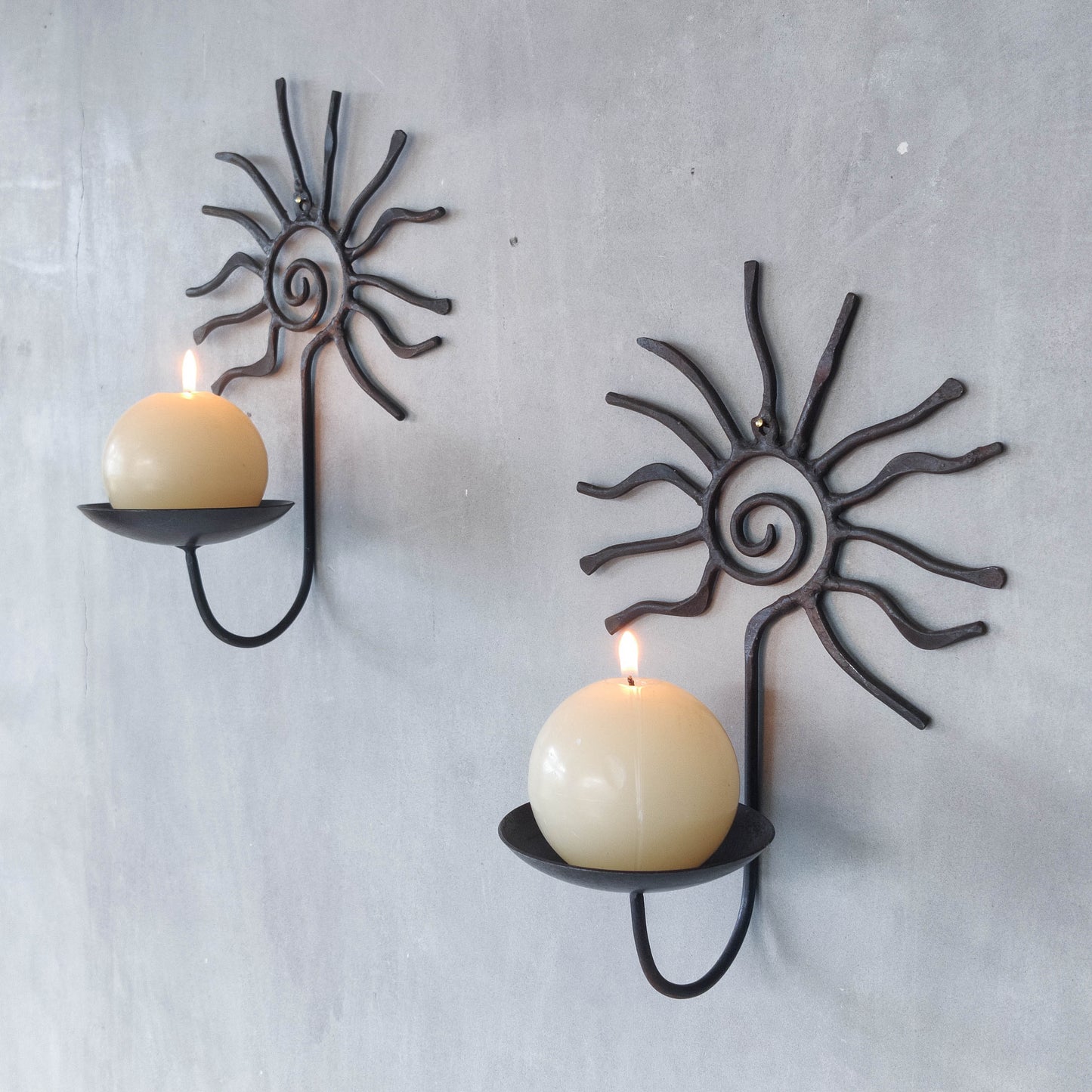 Pair of vintage 90s welded steel sun ray spiral swirl candle wall sconces