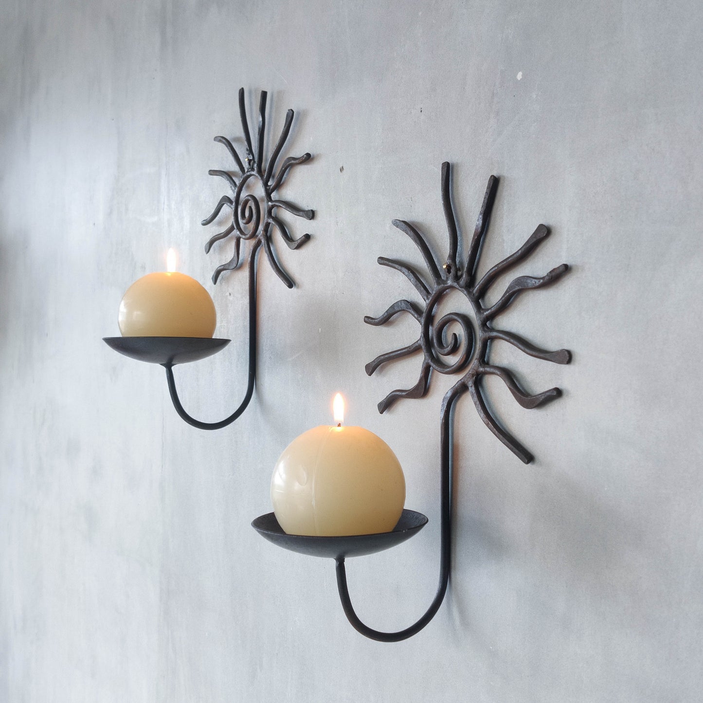 Pair of vintage 90s welded steel sun ray spiral swirl candle wall sconces