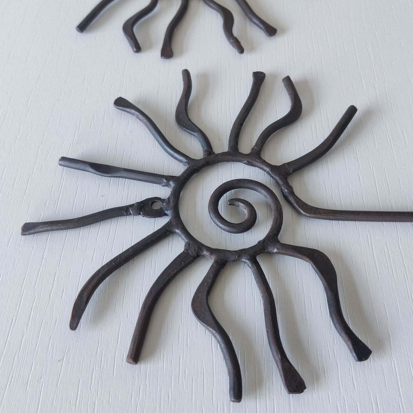 Pair of vintage 90s welded steel sun ray spiral swirl candle wall sconces