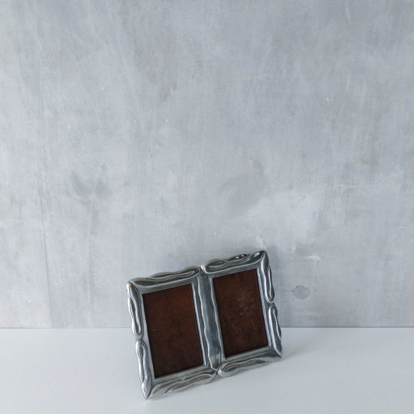 Vintage 1990s cast aluminium organic modernist form double picture photo frame