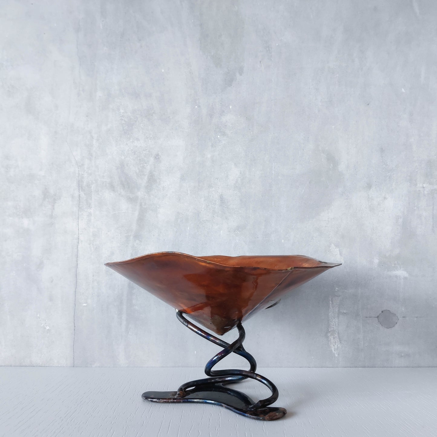 Artisan made copper metalwork conical footed bowl with twisted steel base signed