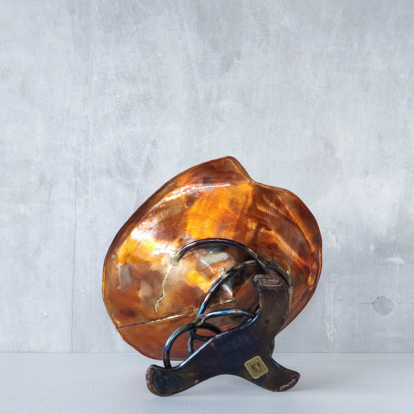 Artisan made copper metalwork conical footed bowl with twisted steel base signed