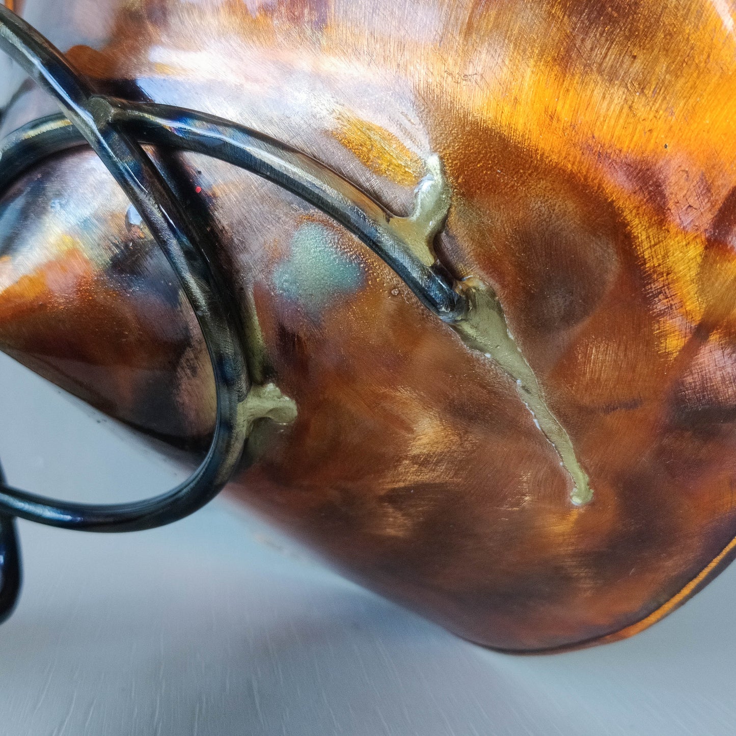 Artisan made copper metalwork conical footed bowl with twisted steel base signed