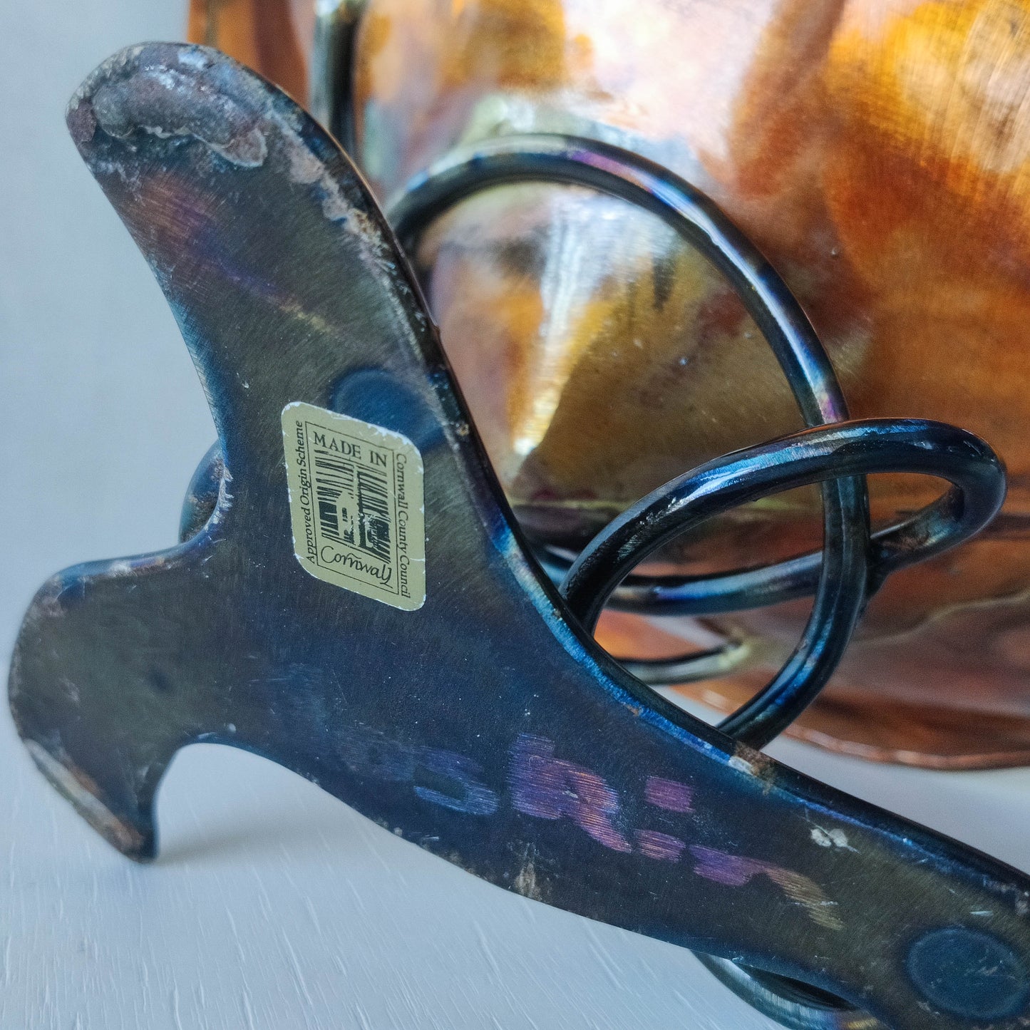 Artisan made copper metalwork conical footed bowl with twisted steel base signed