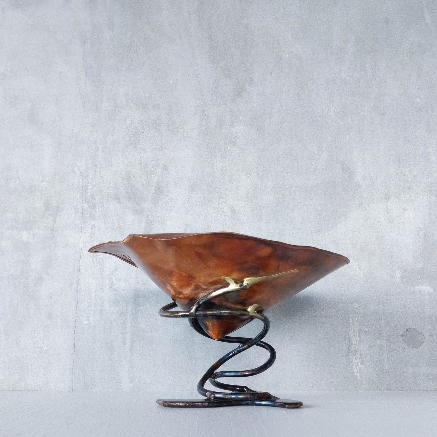 Artisan made copper metalwork conical footed bowl with twisted steel base signed