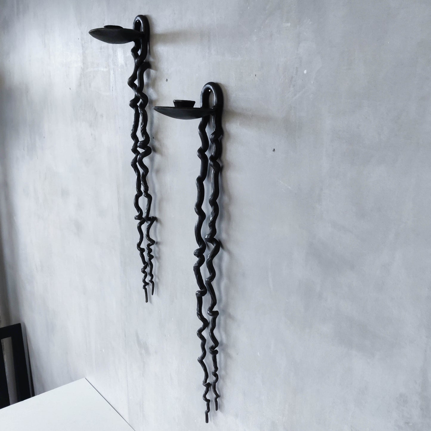 Pair of wrought iron blacksmith made twisted sculptural candle wall sconces