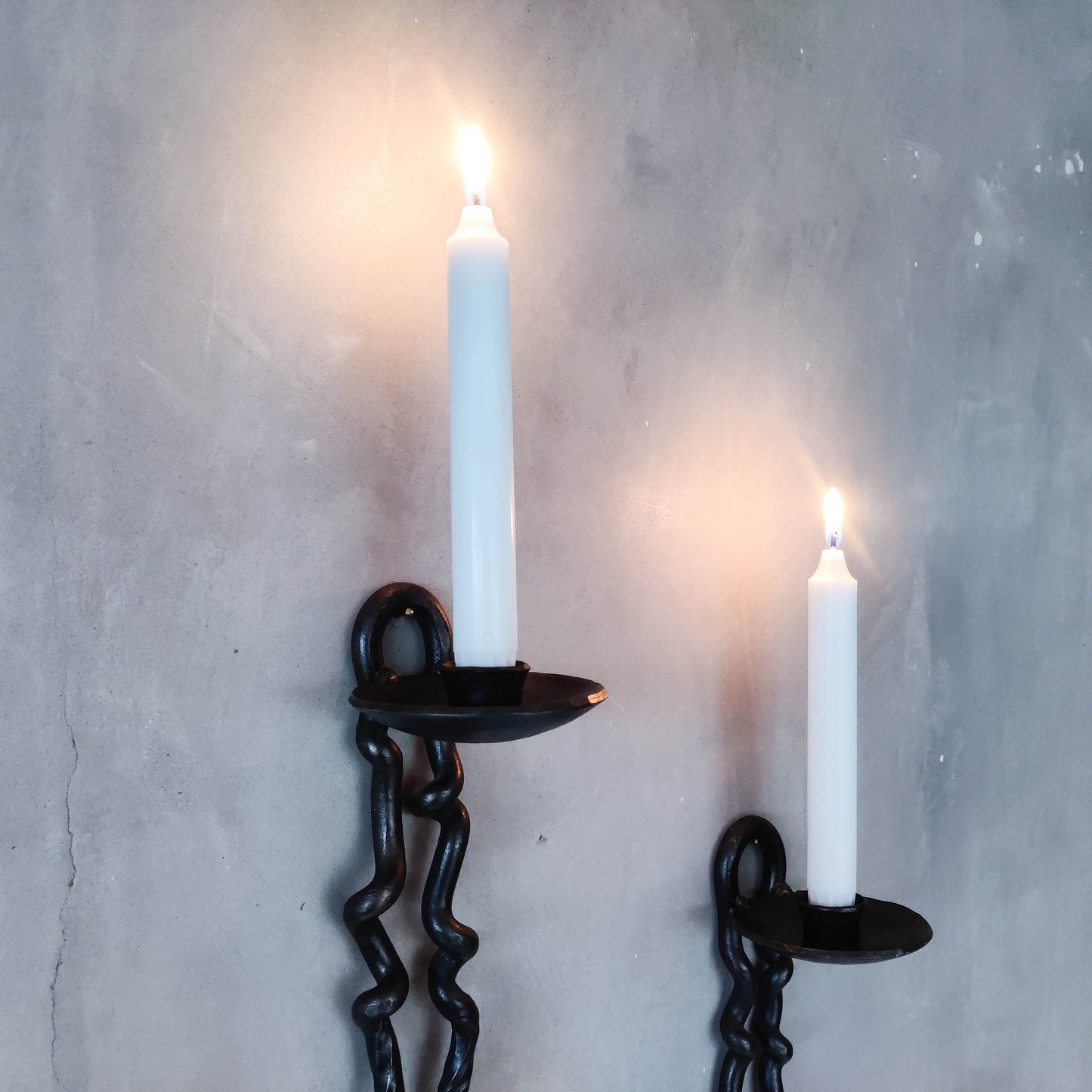 Pair of wrought iron blacksmith made twisted sculptural candle wall sconces