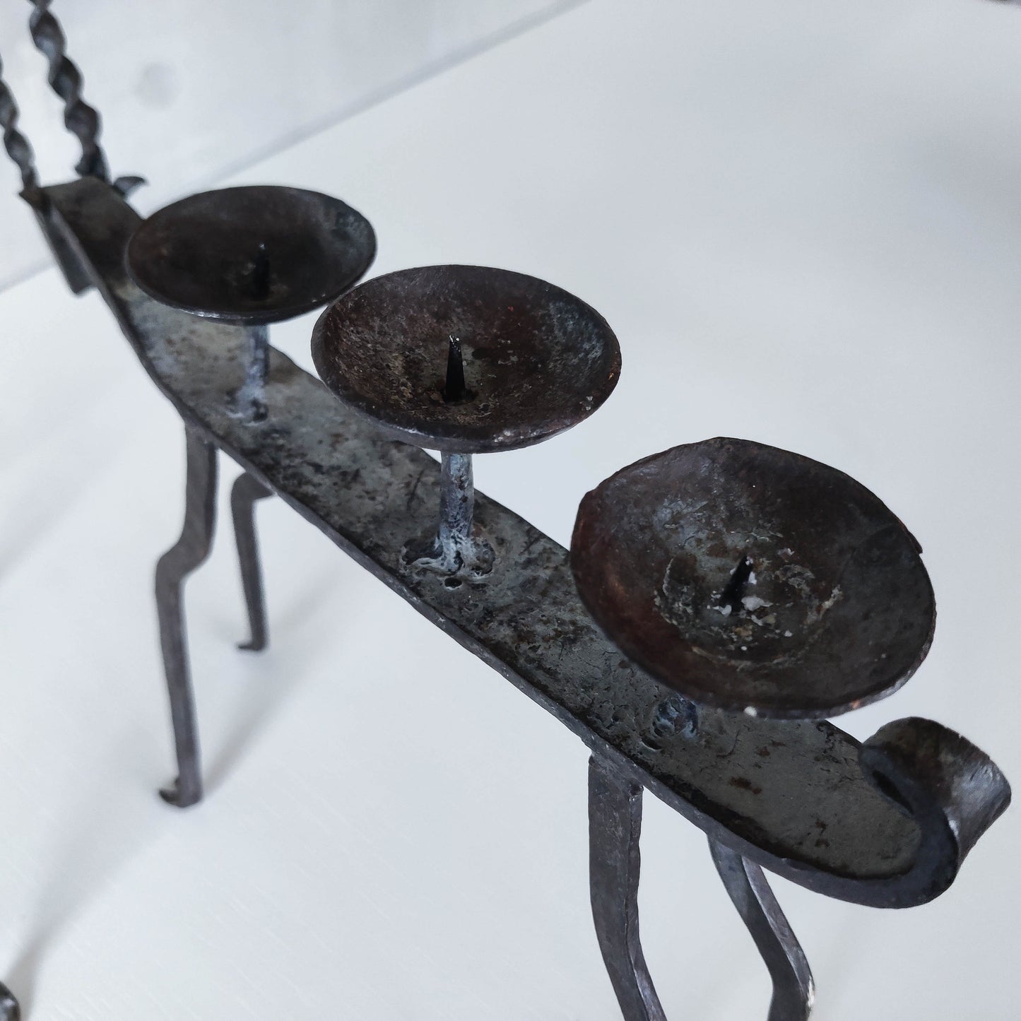 Pair of brutalist vintage wrought iron primitive antelope deer candelabras