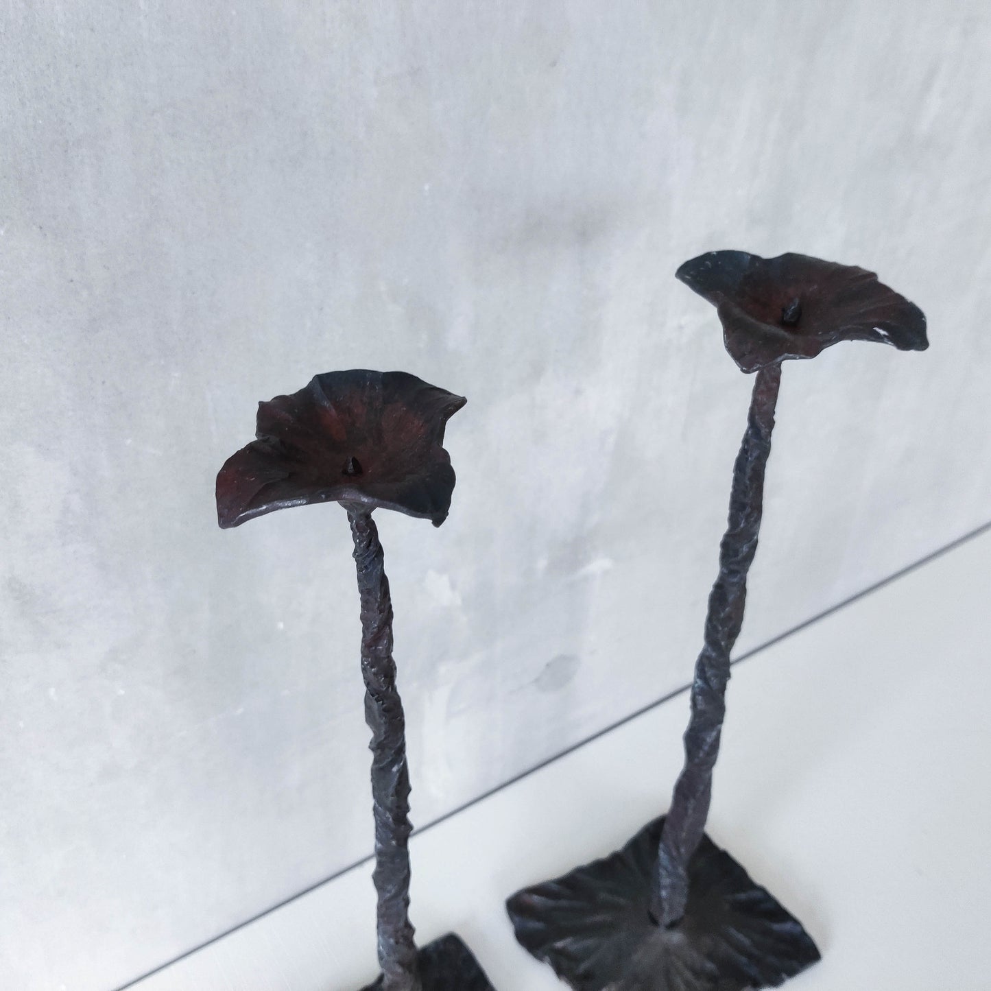 Pair of brutalist style hammered wrought iron blacksmith made pricket top candle holders