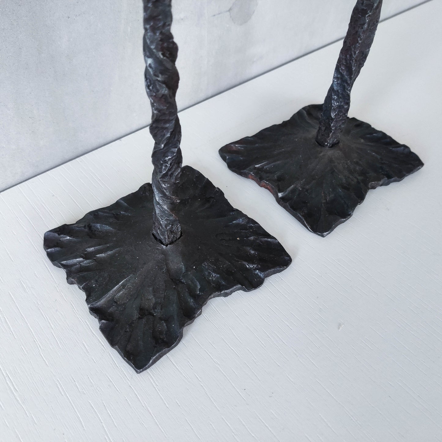 Pair of brutalist style hammered wrought iron blacksmith made pricket top candle holders