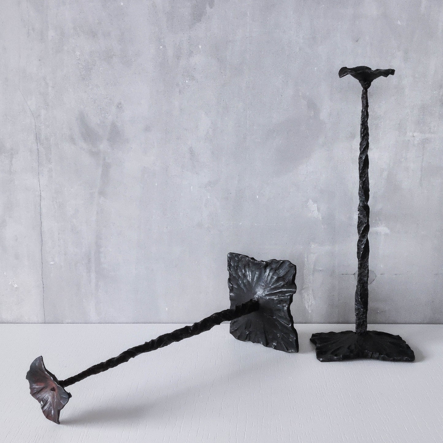 Pair of brutalist style hammered wrought iron blacksmith made pricket top candle holders