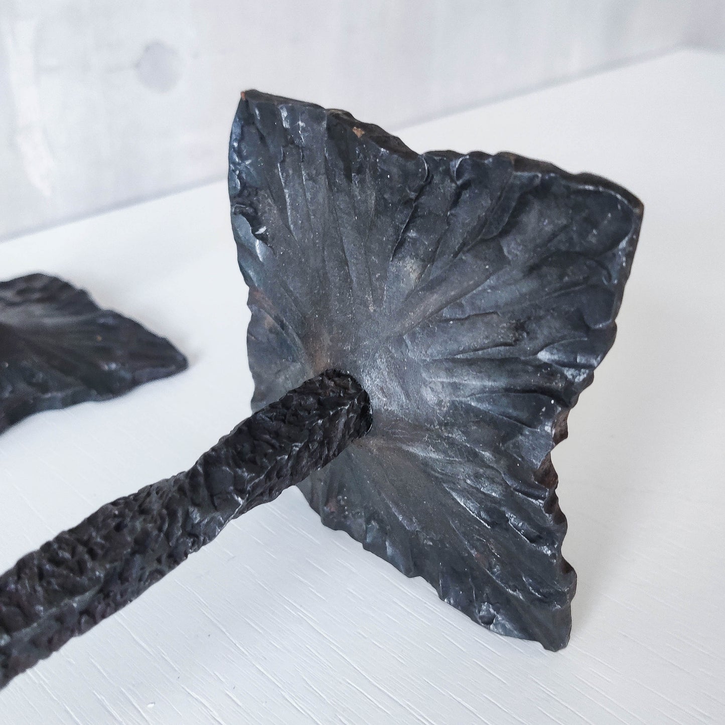 Pair of brutalist style hammered wrought iron blacksmith made pricket top candle holders