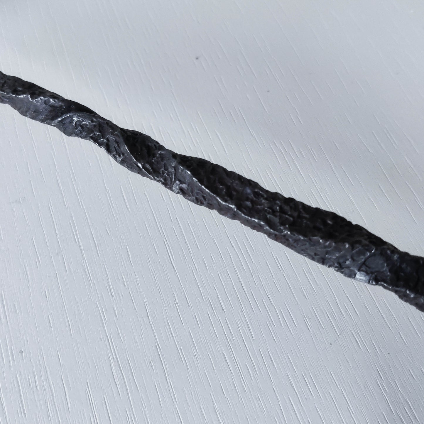 Pair of brutalist style hammered wrought iron blacksmith made pricket top candle holders