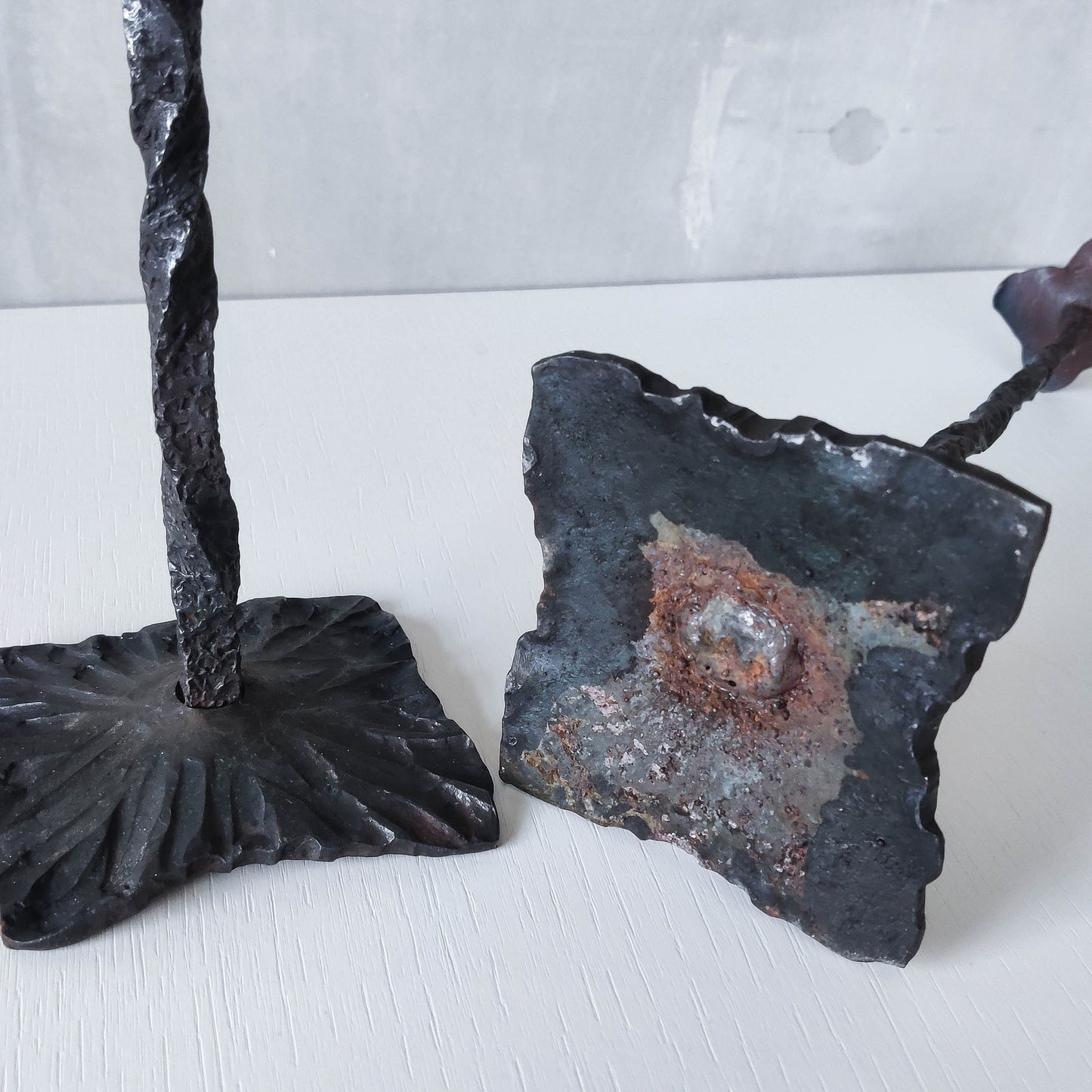 Pair of brutalist style hammered wrought iron blacksmith made pricket top candle holders