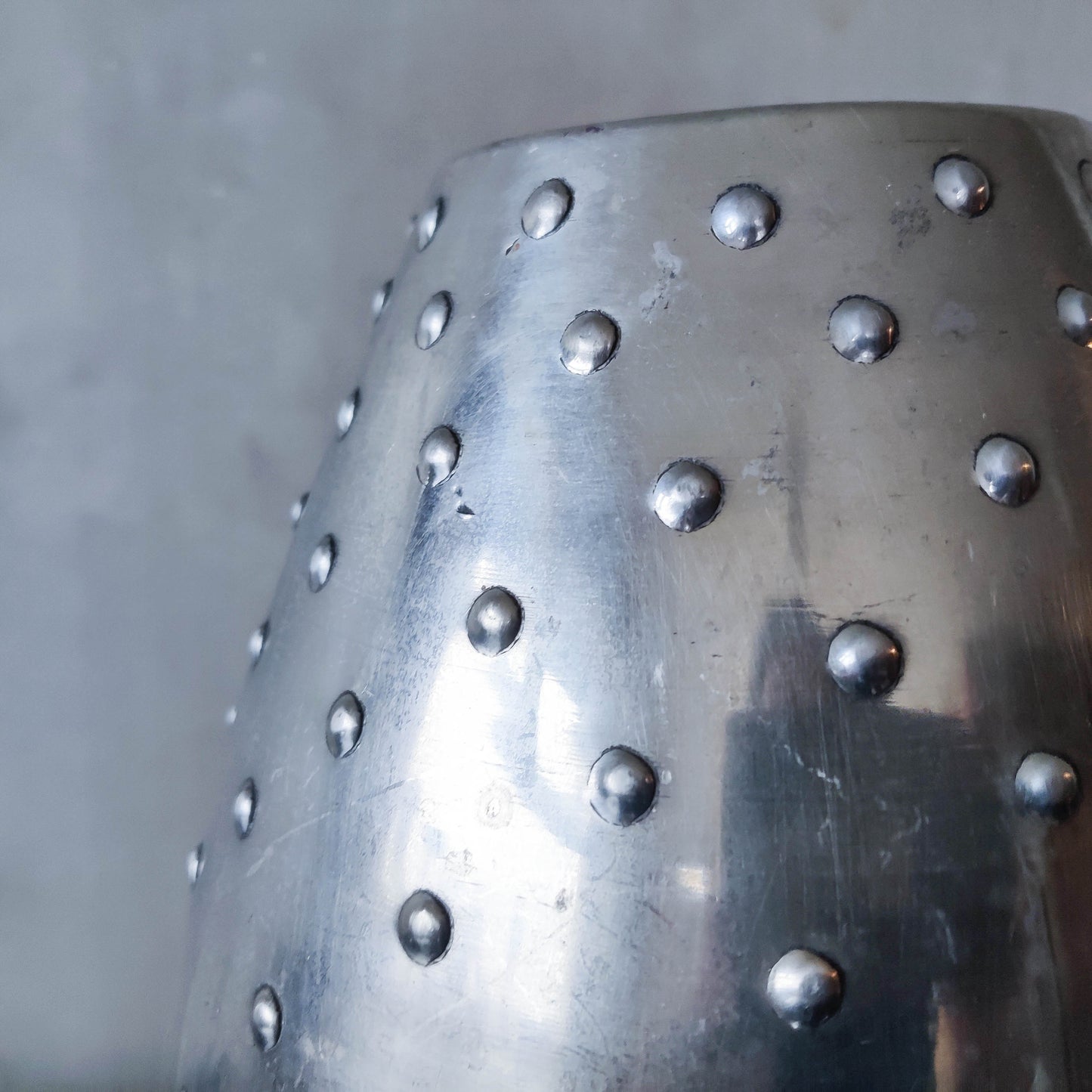 Large vintage 1990s silver pressed metal hobnail studded dimple vase Leon Fontier style