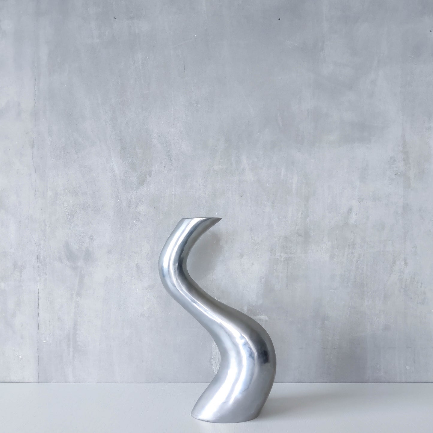 Vintage 1990s hand cast aluminium wavy sculptural S vase