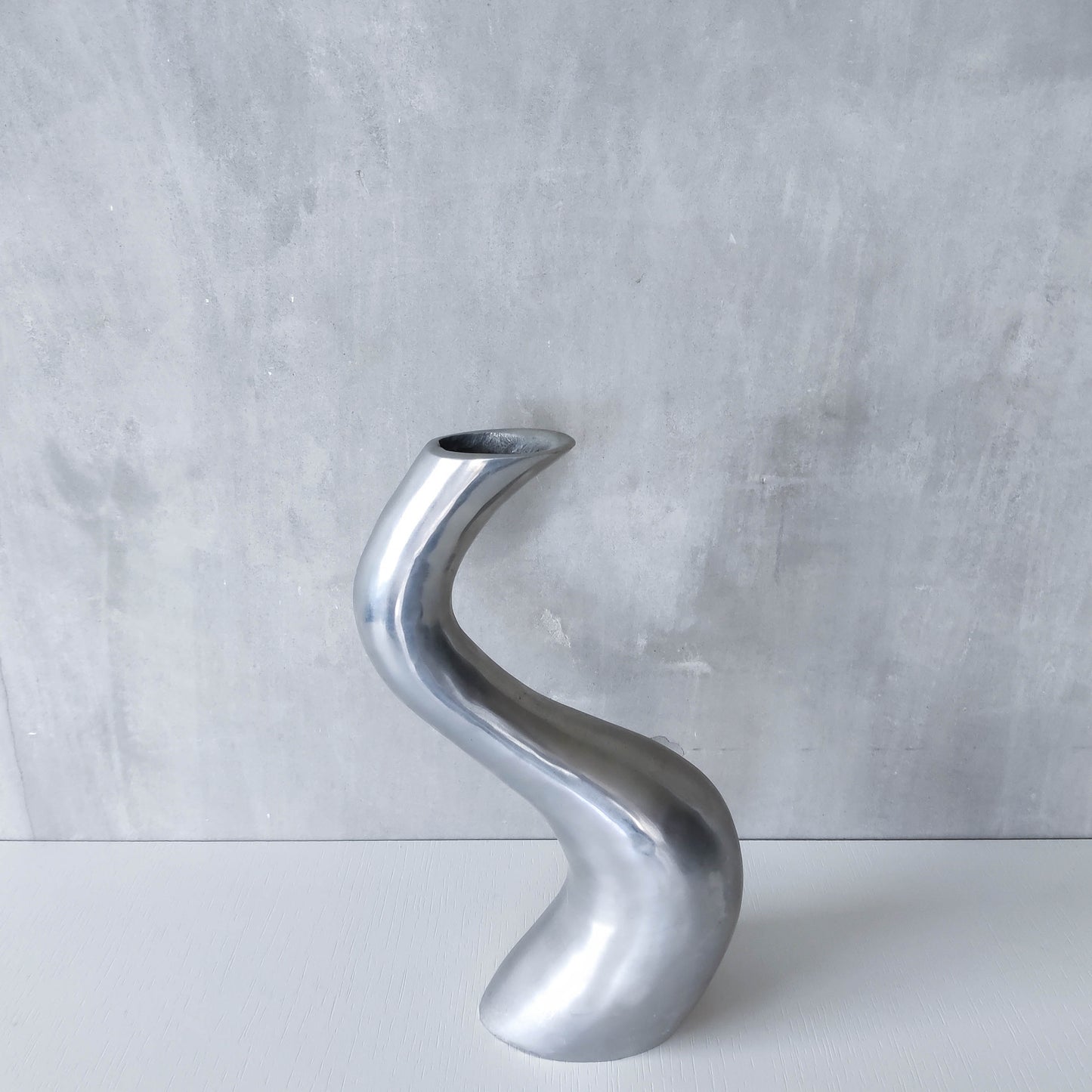 Vintage 1990s hand cast aluminium wavy sculptural S vase