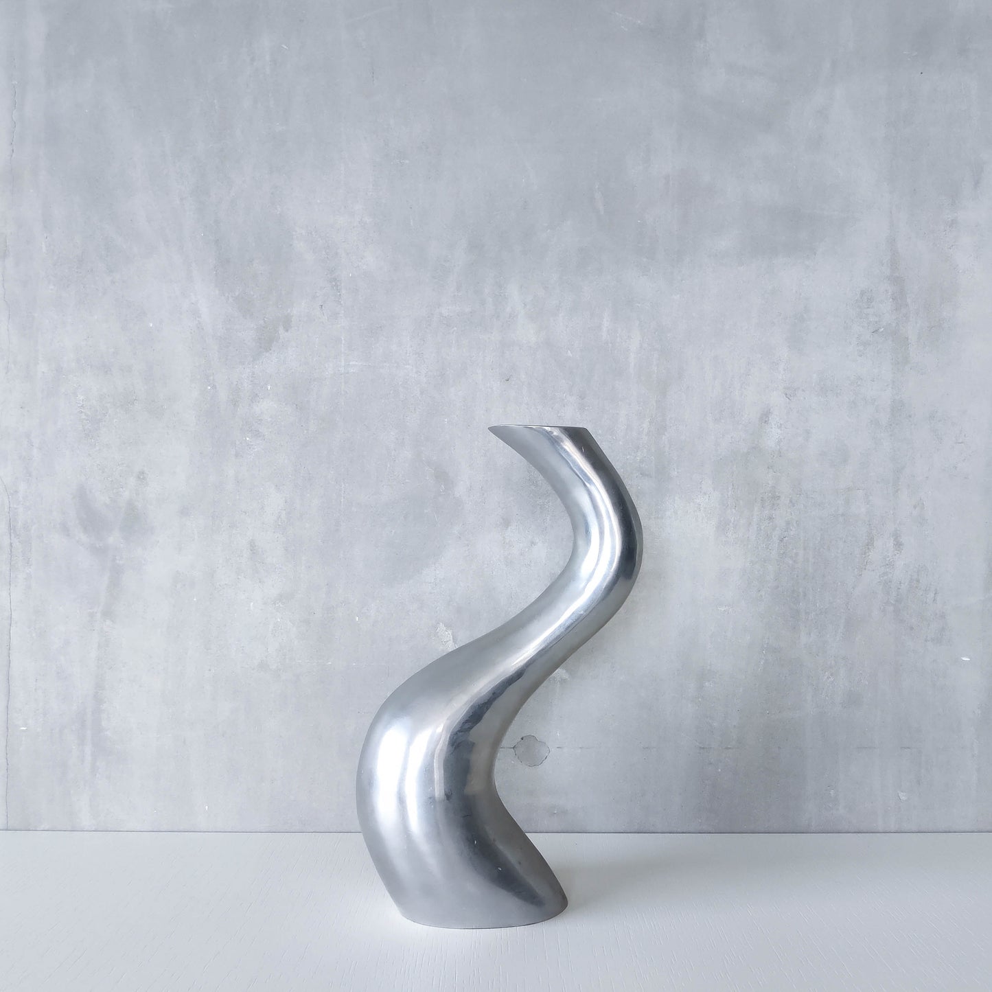 Vintage 1990s hand cast aluminium wavy sculptural S vase