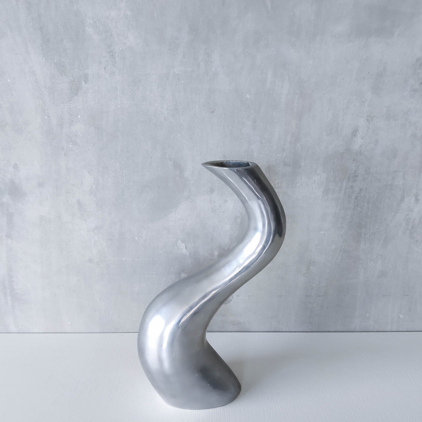 Vintage 1990s hand cast aluminium wavy sculptural S vase