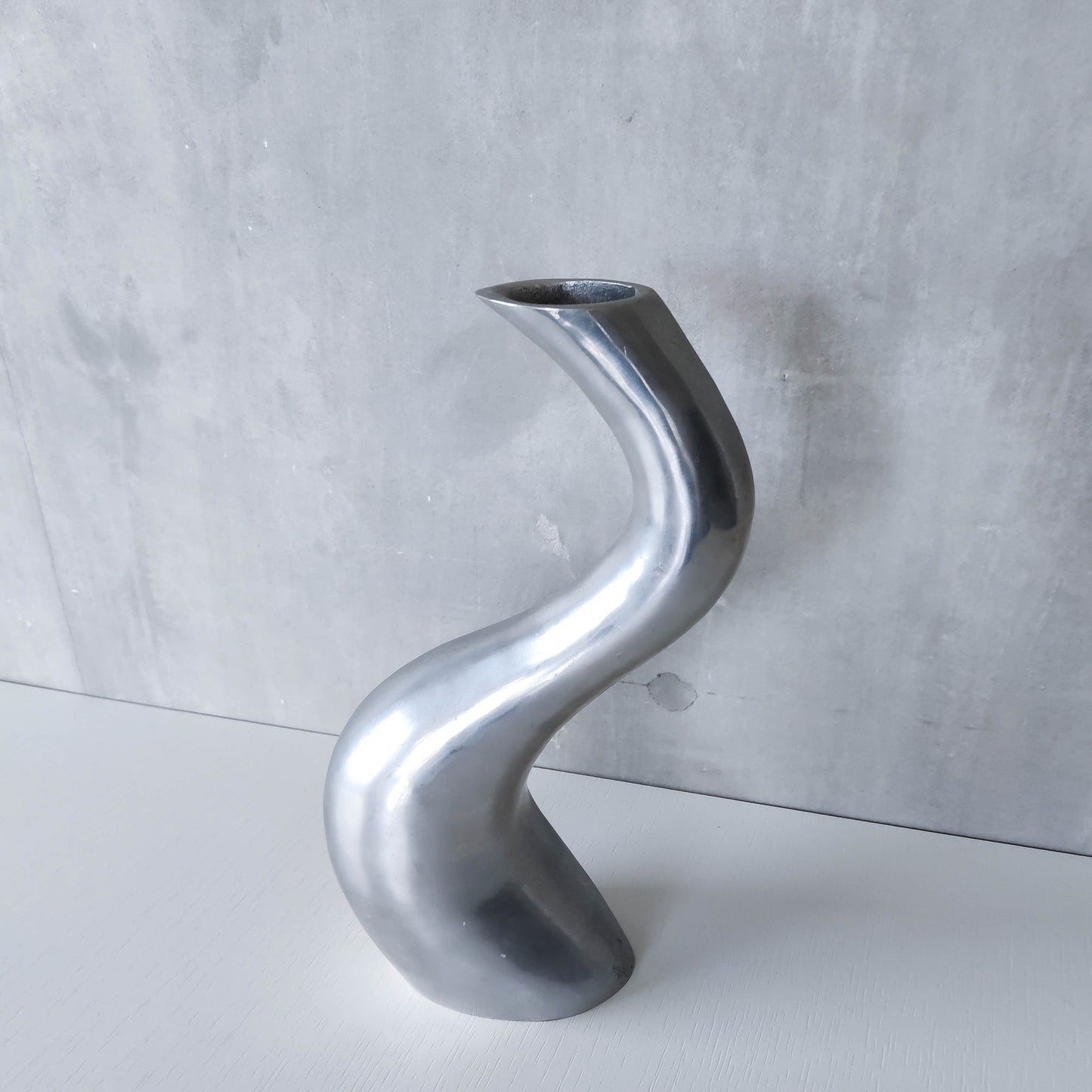 Vintage 1990s hand cast aluminium wavy sculptural S vase