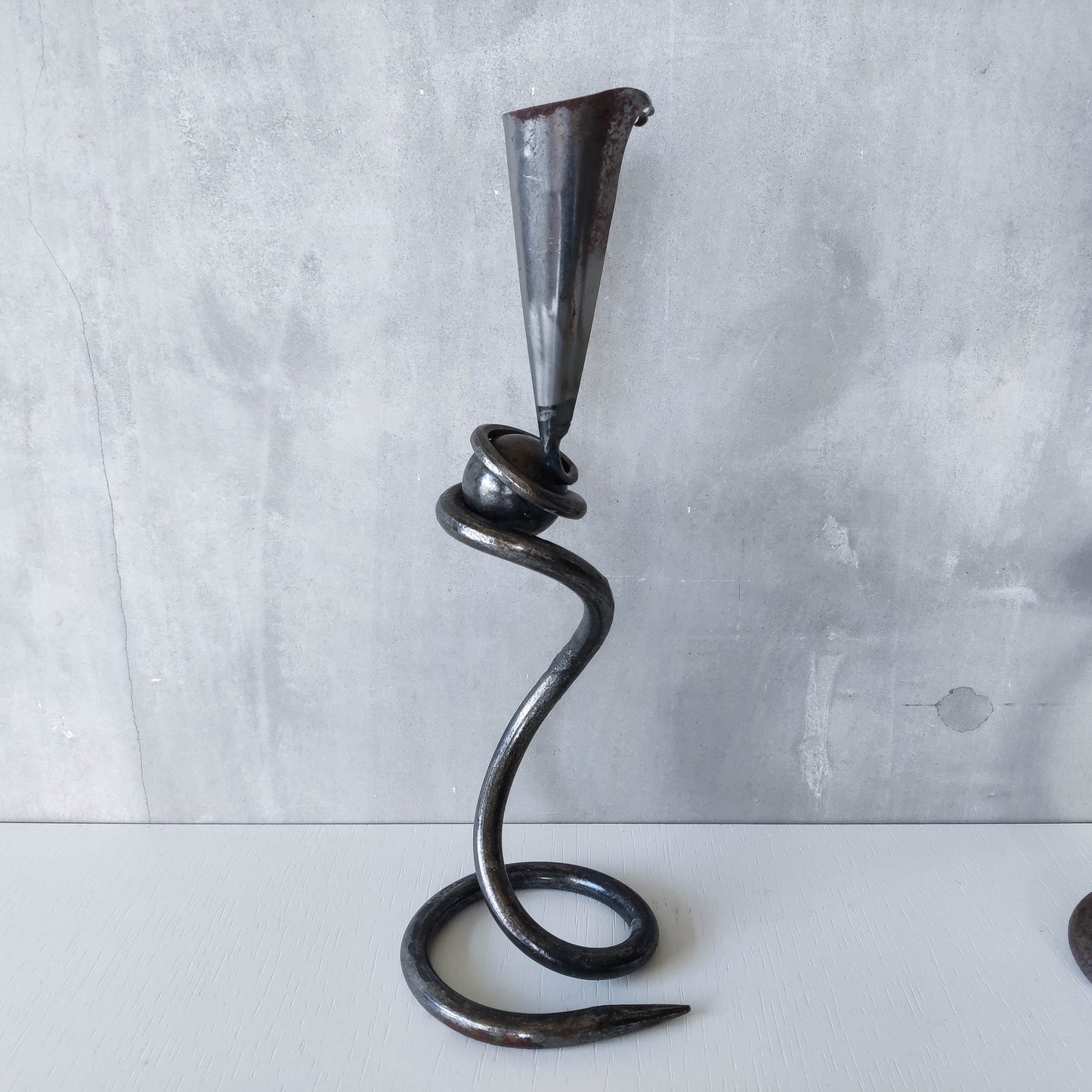 Trio of sculptural handmade wrought iron welded steel candle holders with steel balls