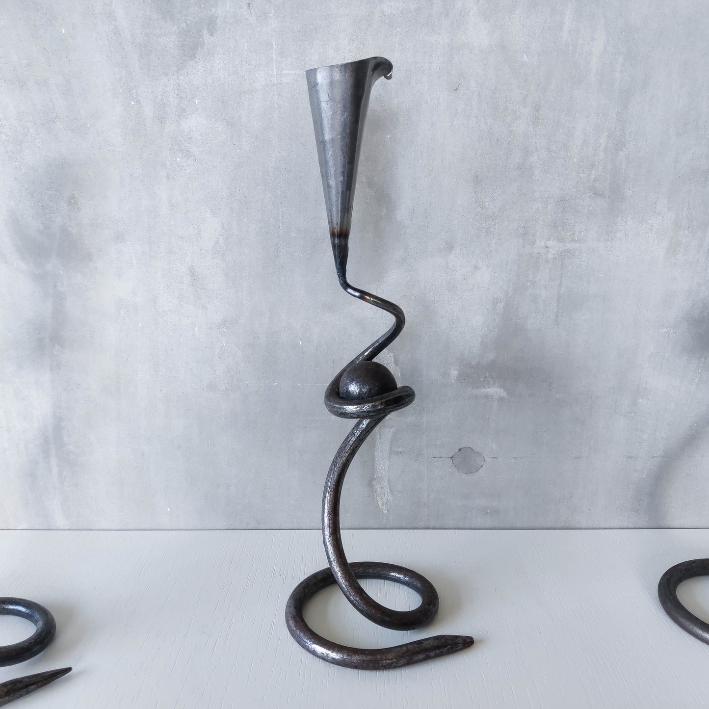 Trio of sculptural handmade wrought iron welded steel candle holders with steel balls