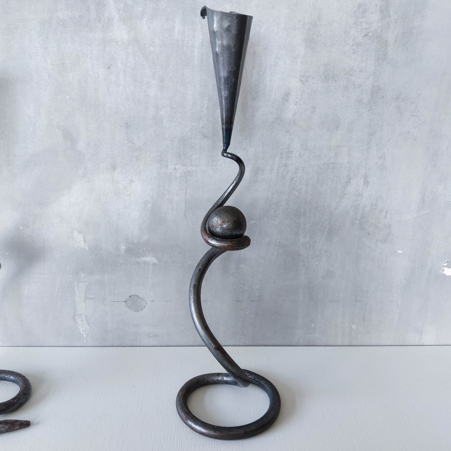 Trio of sculptural handmade wrought iron welded steel candle holders with steel balls